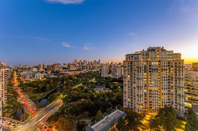 a view of a balcony with city view
