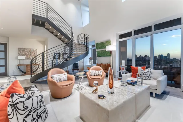 a outdoor living space with furniture and a chandelier