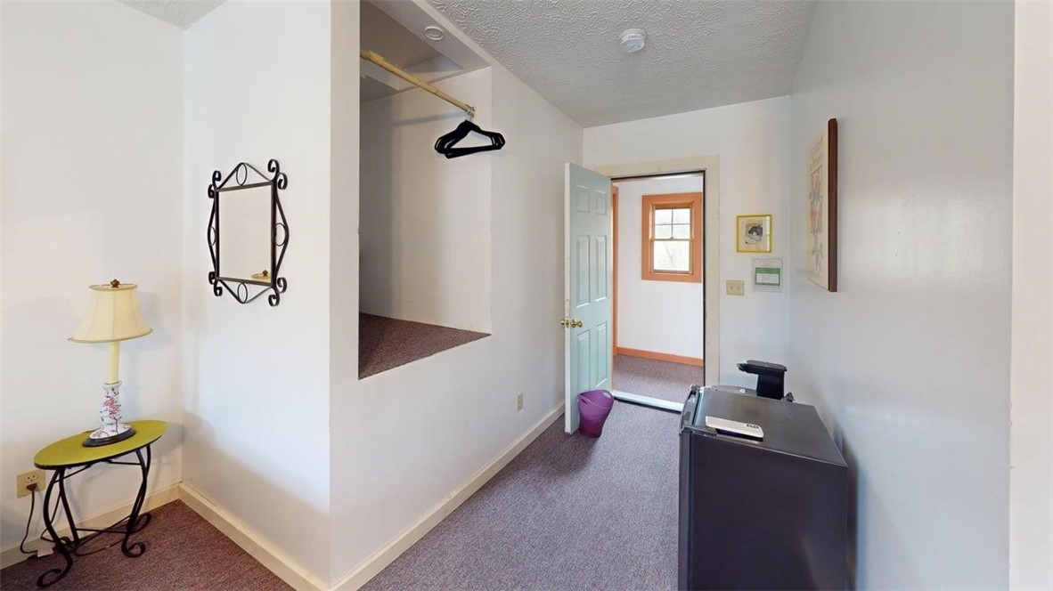 7667 State Highway Springfield Center, NY 13468 - Photo 35 of 50 Suite 1 storage and hallway entrance.