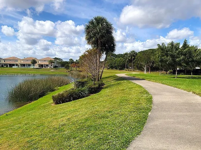 a view of a lake with a big yard