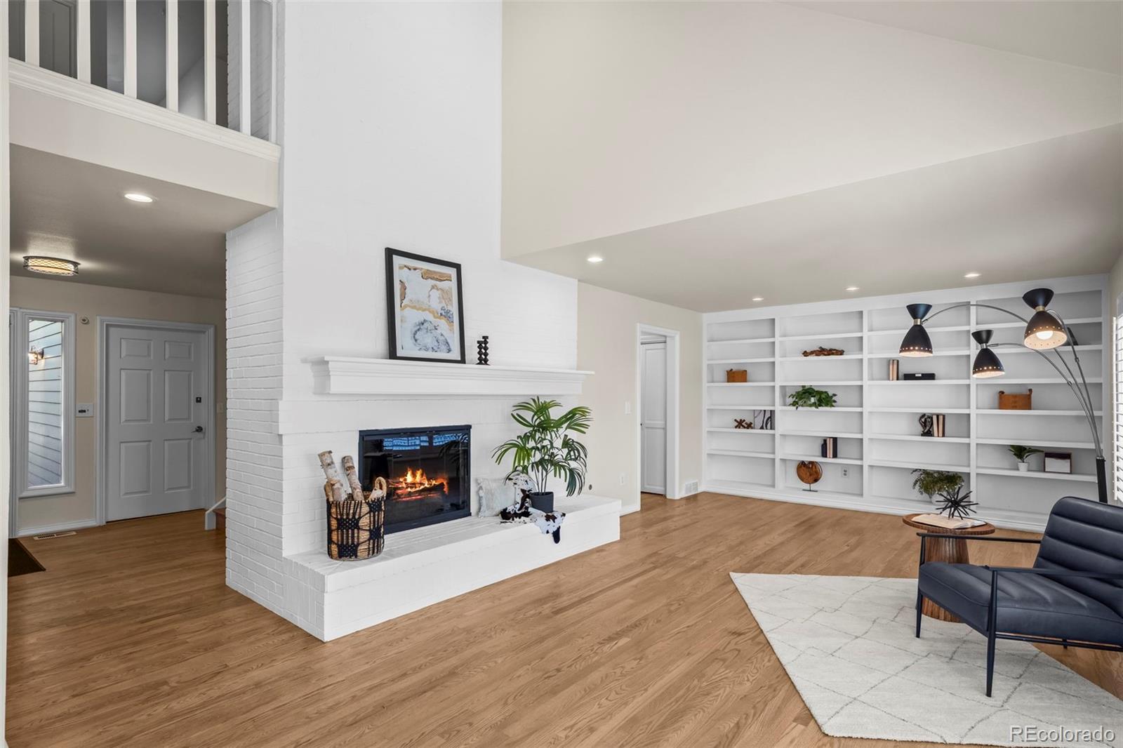 7264 Siena Way, Unit C Boulder, CO 80301 - Photo 12 of 48 a living room with furniture and a fireplace