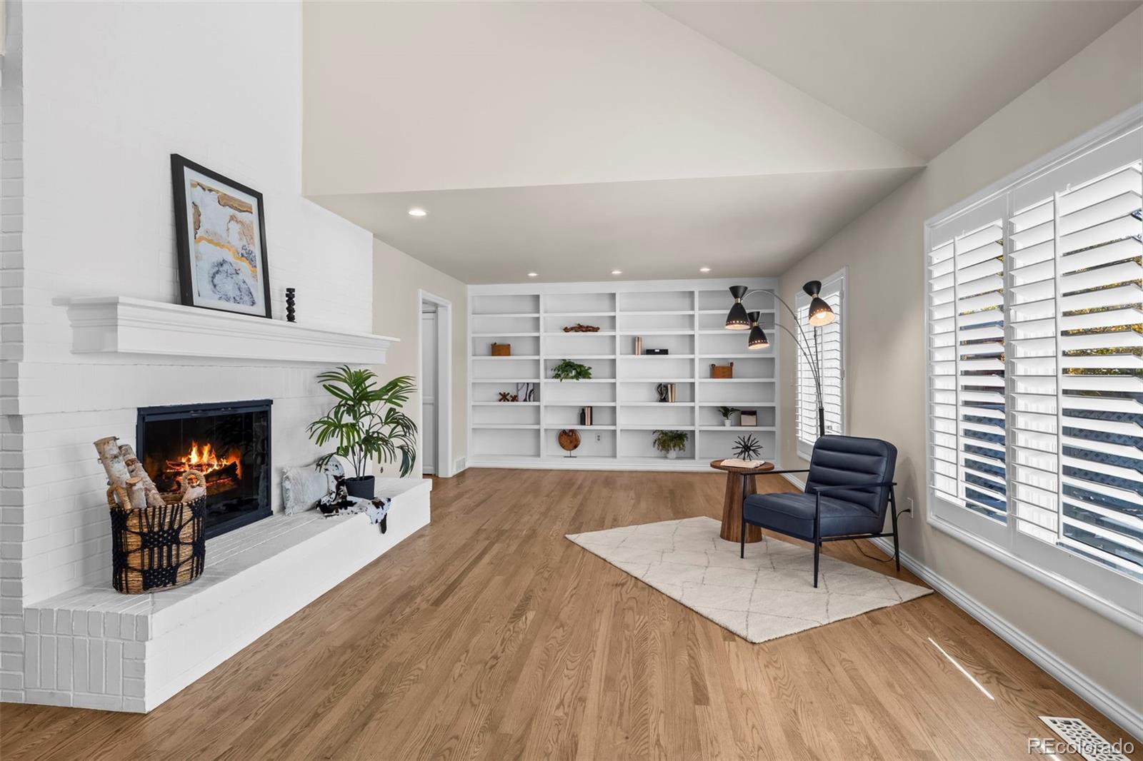 7264 Siena Way, Unit C Boulder, CO 80301 - Photo 13 of 48 a living room with furniture and a fireplace