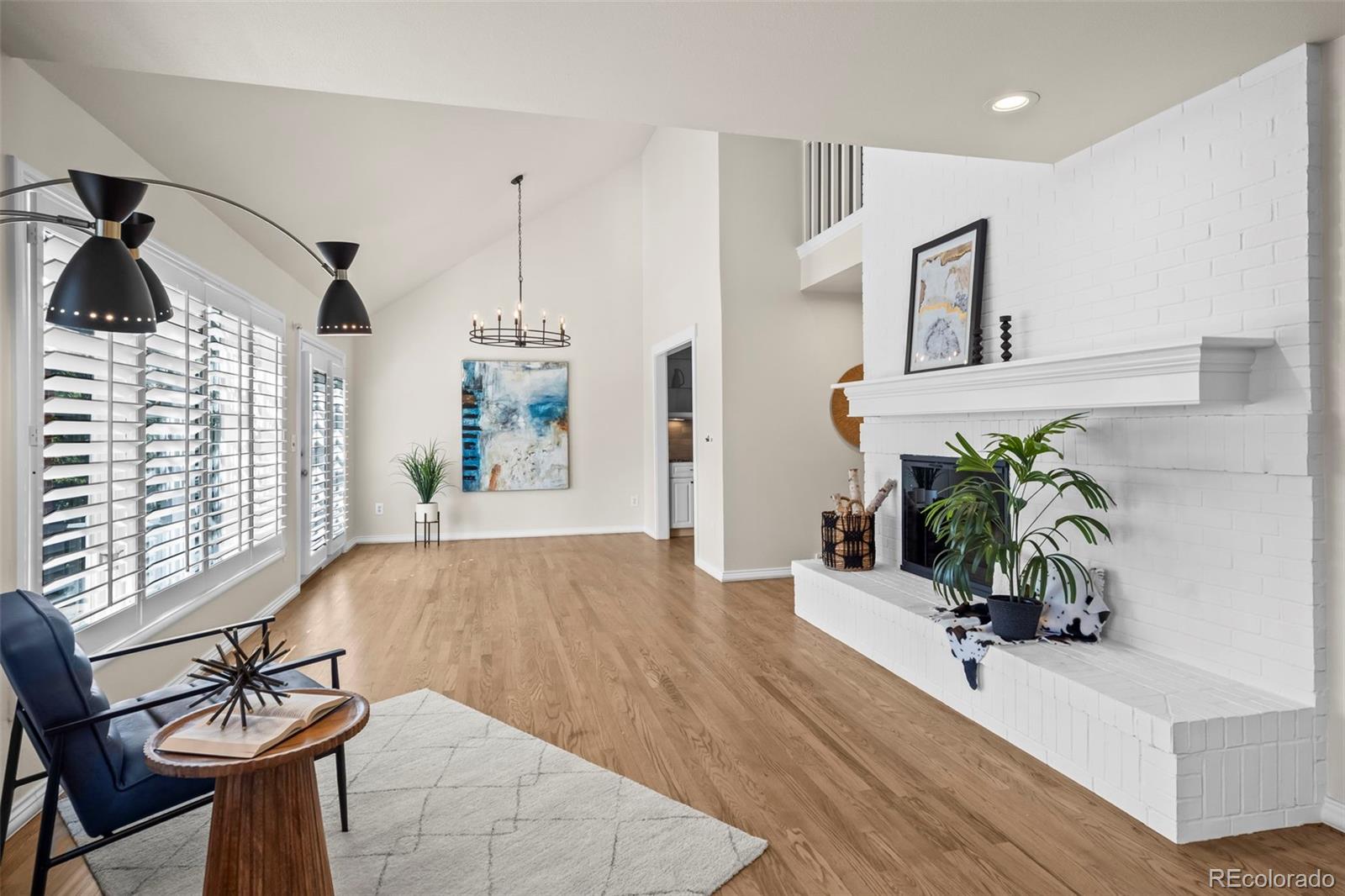 7264 Siena Way, Unit C Boulder, CO 80301 - Photo 14 of 48 a living room with furniture and a potted plant