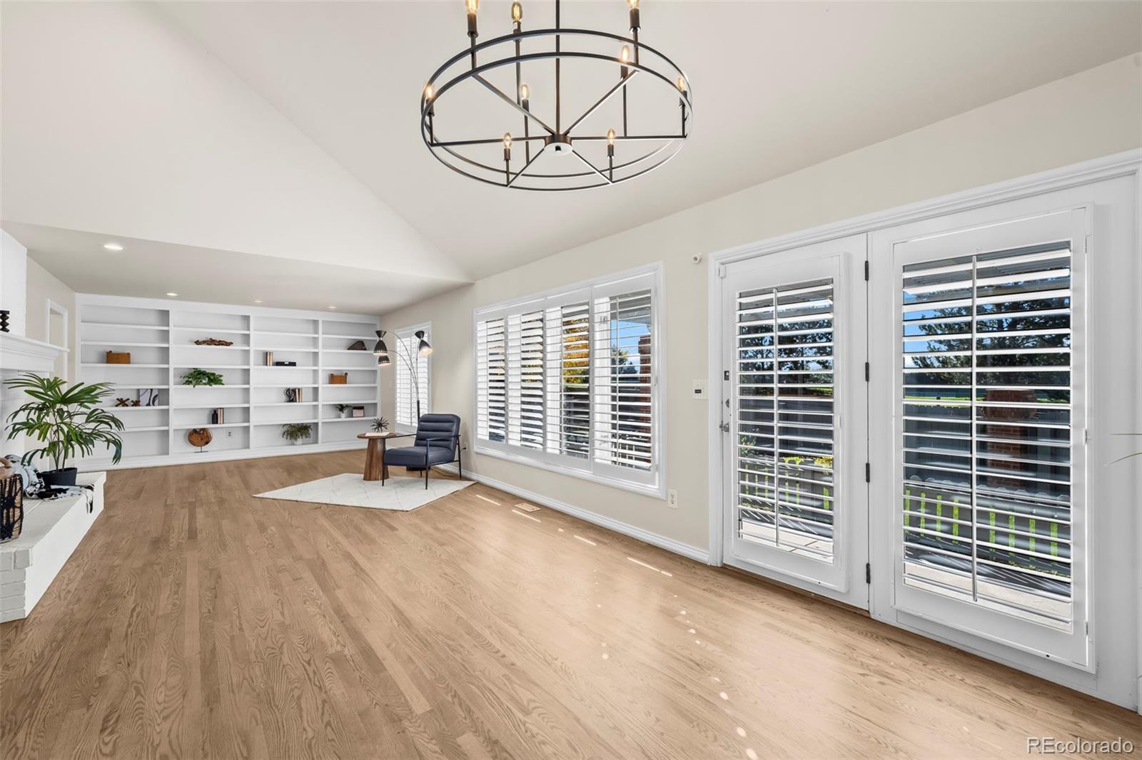 7264 Siena Way, Unit C Boulder, CO 80301 - Photo 16 of 48 a view of a livingroom with furniture window and wooden floor