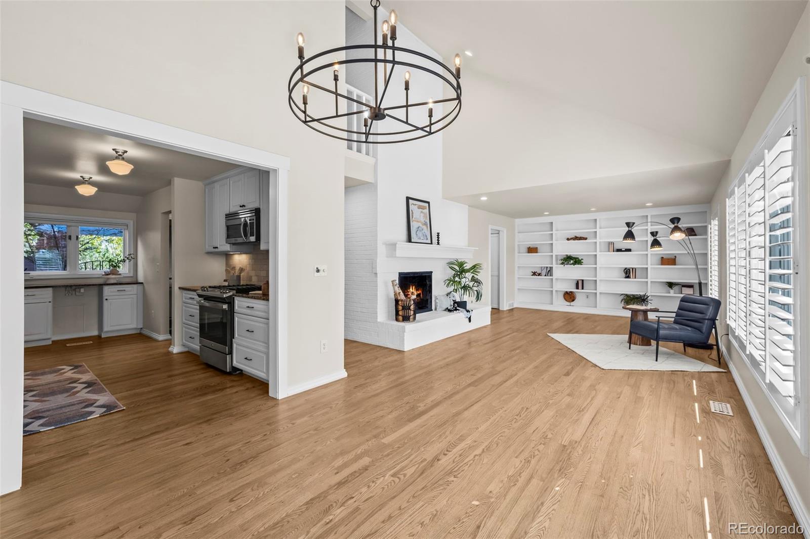 7264 Siena Way, Unit C Boulder, CO 80301 - Photo 17 of 48 a view of a livingroom with furniture and a kitchen