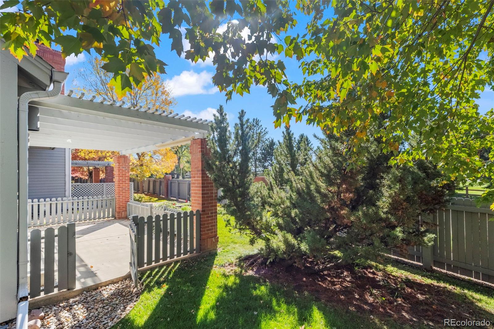 7264 Siena Way, Unit C Boulder, CO 80301 - Photo 19 of 48 a view of a house with a tree