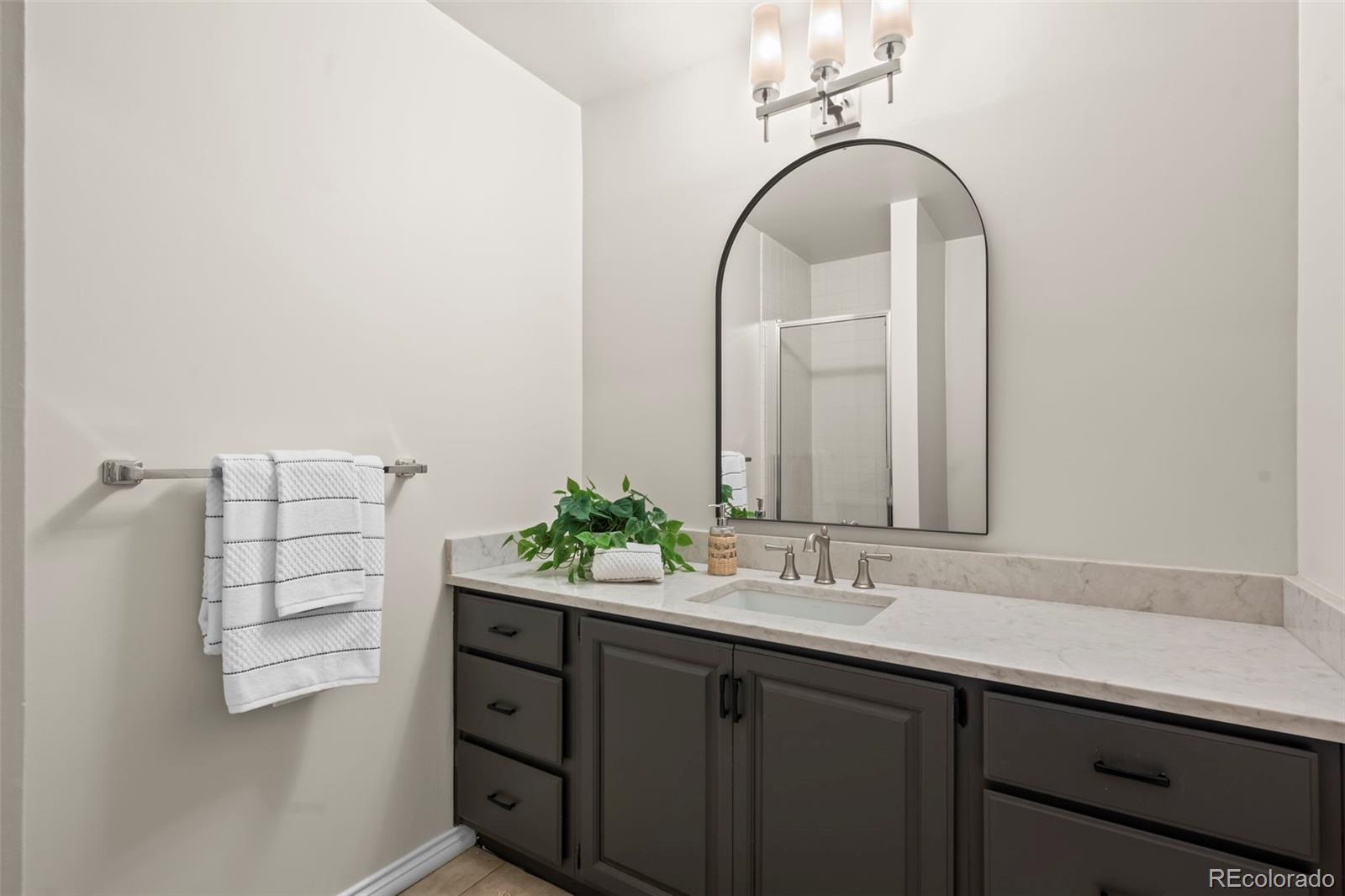 7264 Siena Way, Unit C Boulder, CO 80301 - Photo 22 of 48 a bathroom with a sink and a mirror