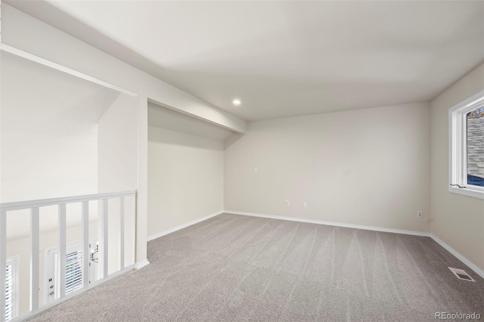7264 Siena Way, Unit C Boulder, CO 80301 - Photo 24 of 48 wooden floor in an empty room with a window