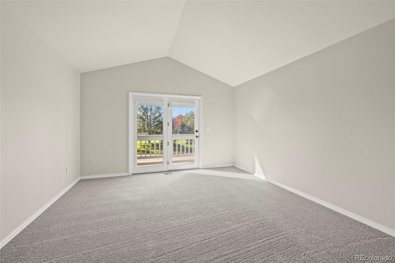 7264 Siena Way, Unit C Boulder, CO 80301 - Photo 28 of 48 an empty room with windows