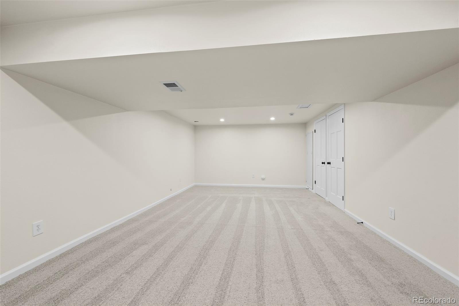 7264 Siena Way, Unit C Boulder, CO 80301 - Photo 36 of 48 a view of an empty room with wooden floor