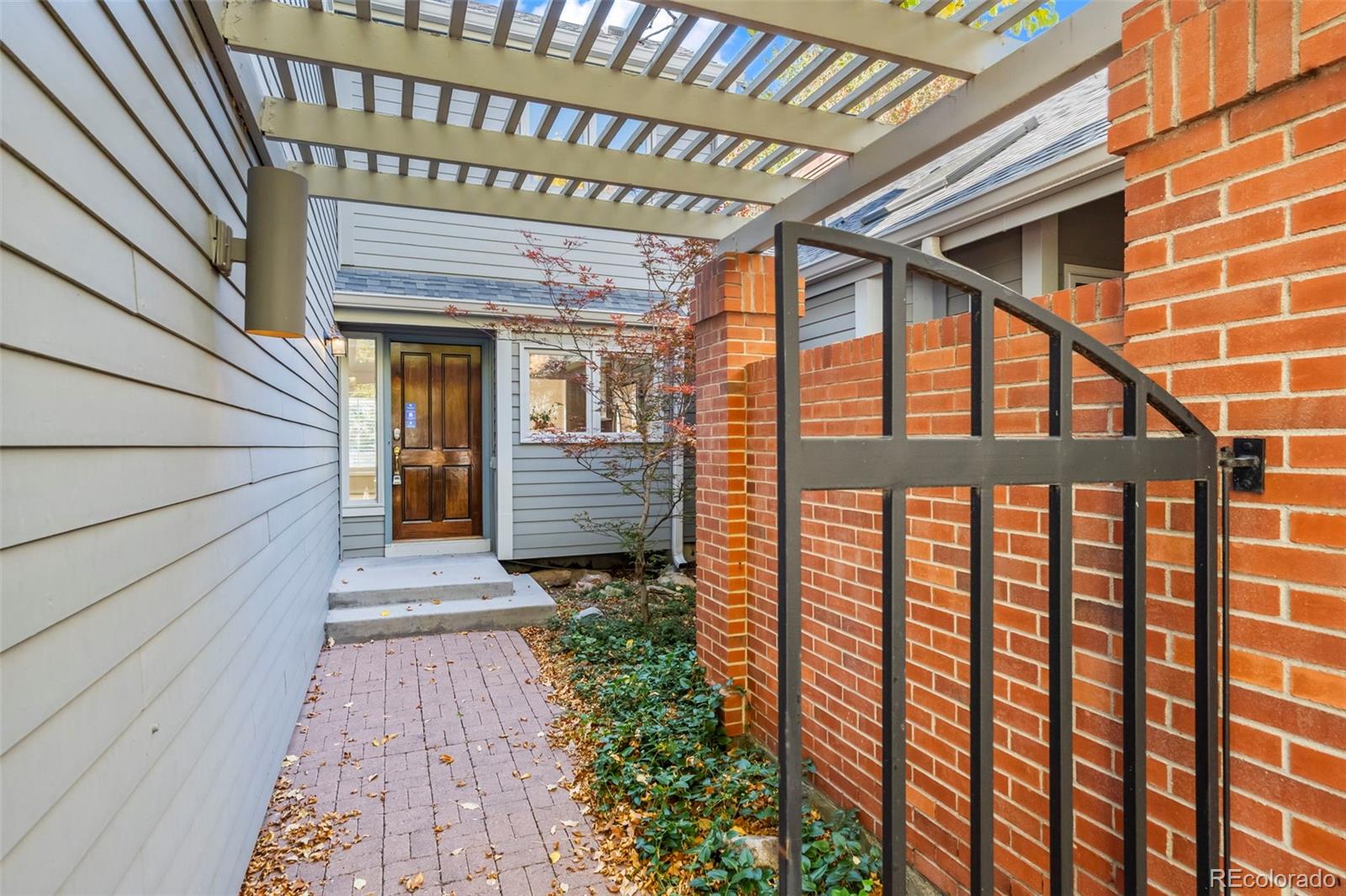 7264 Siena Way, Unit C Boulder, CO 80301 - Photo 5 of 48 a view of a porch with wooden floor