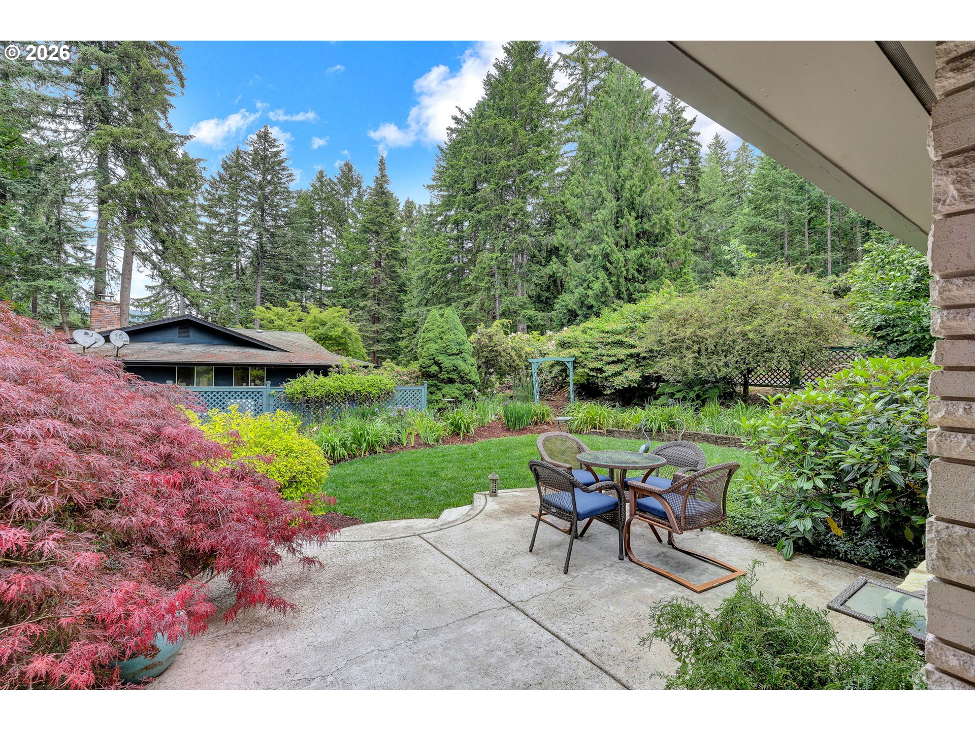 88108 Tiki Lane Springfield, OR 97478 - Photo 7 of 48 a view of a backyard with sitting area