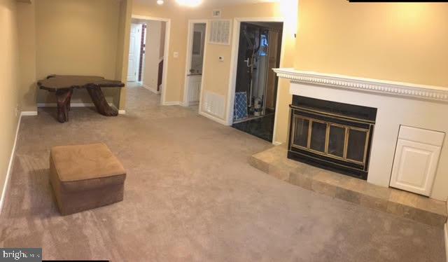 428 Haslett Road Joppa, MD 21085 - Photo 33 of 36 COZY WARM WOOD STOVE IN FINISHED LOWER LEVEL