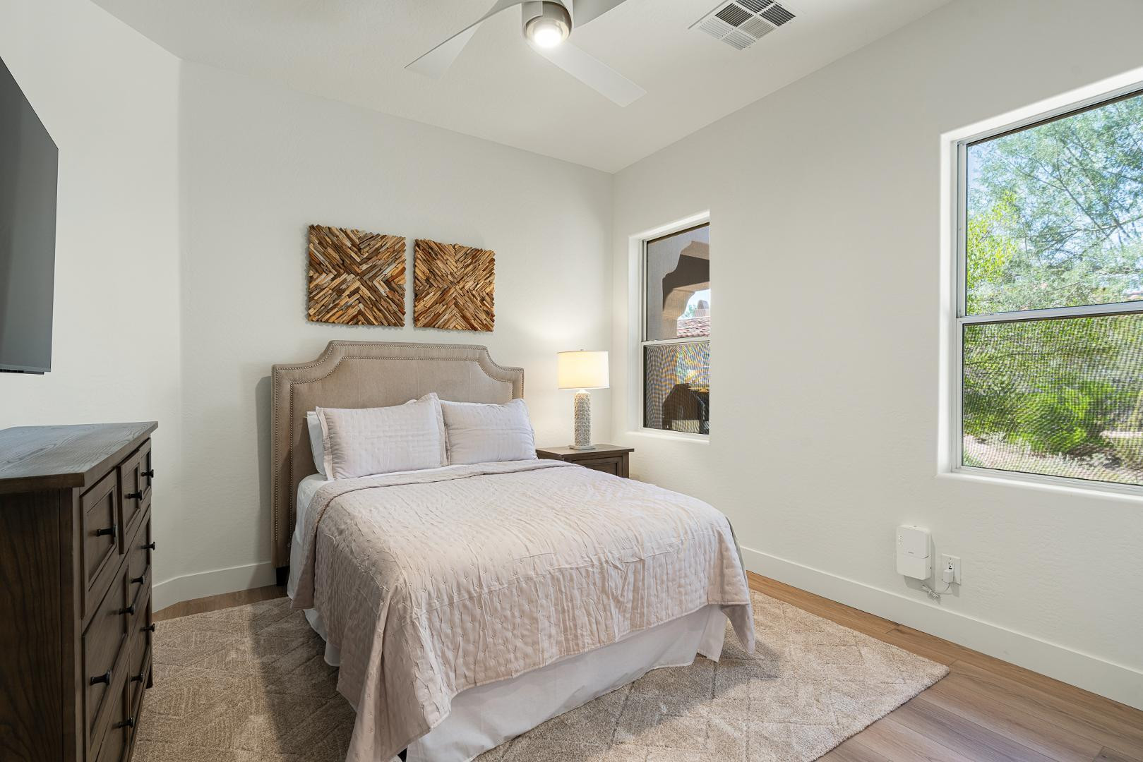 8905 East Mountain Spring Road, Unit 37 Scottsdale, AZ 85255 - Photo 22 of 31 a bedroom with a bed and a window