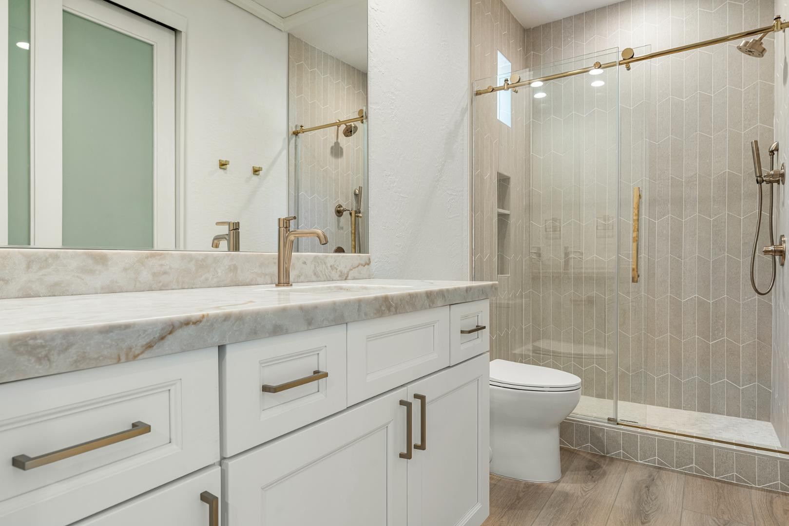 8905 East Mountain Spring Road, Unit 37 Scottsdale, AZ 85255 - Photo 23 of 31 a bathroom with a granite countertop sink a toilet and shower