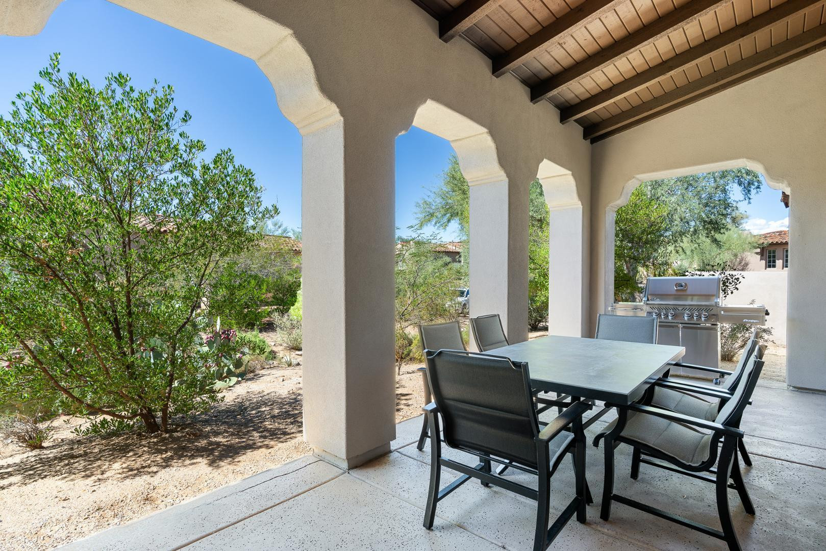 8905 East Mountain Spring Road, Unit 37 Scottsdale, AZ 85255 - Photo 25 of 31 a view of an outdoor dining space with furniture and garden