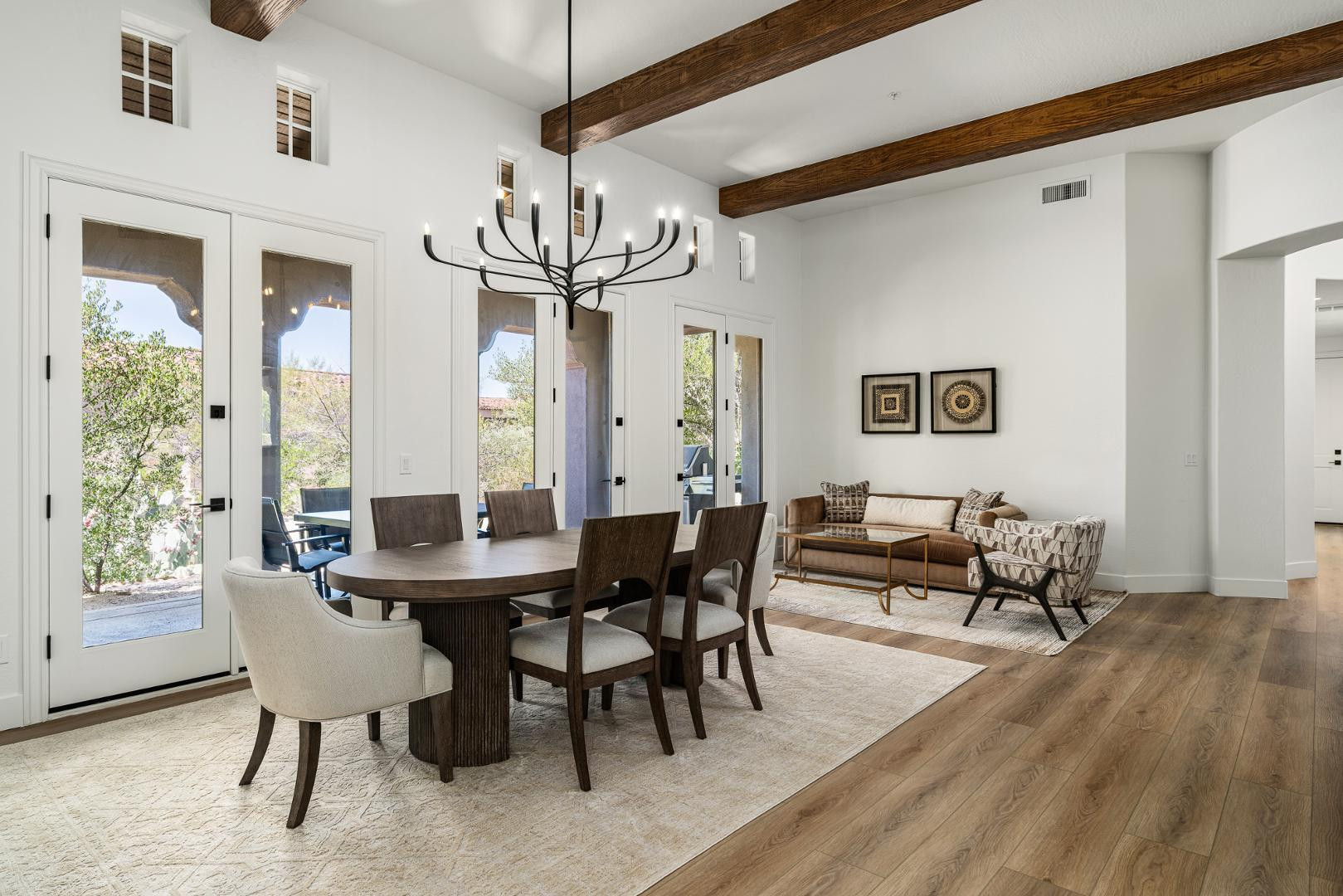 8905 East Mountain Spring Road, Unit 37 Scottsdale, AZ 85255 - Photo 4 of 31 a view of a dining room with furniture window and wooden floor