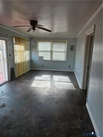 a view of empty room with windows