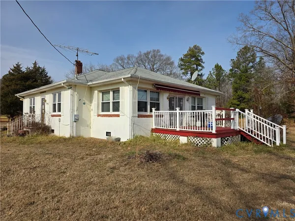 a view of a house with roof deck