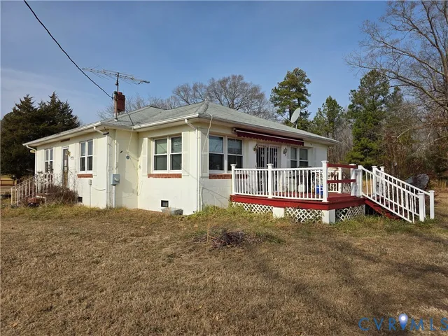 a view of a house with roof deck