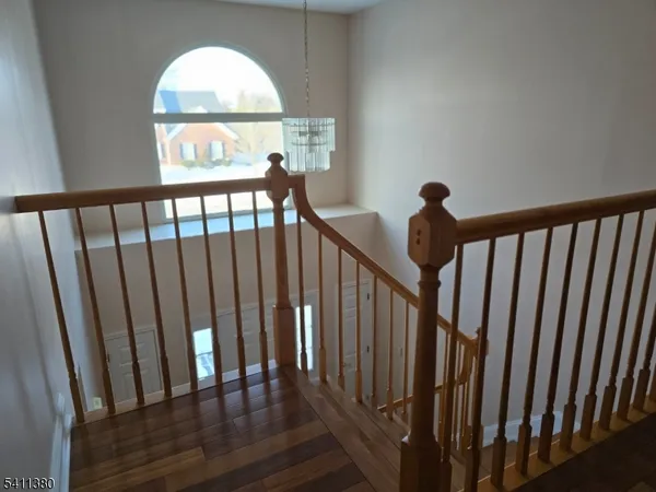 a view of a porch with wooden floor