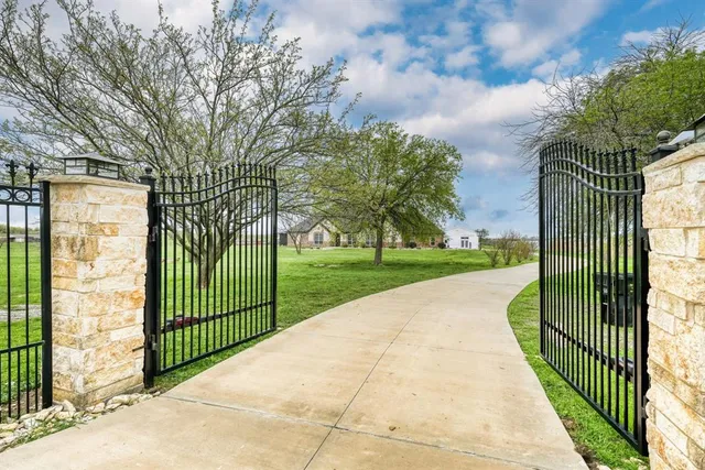 a view of a garden and pathway
