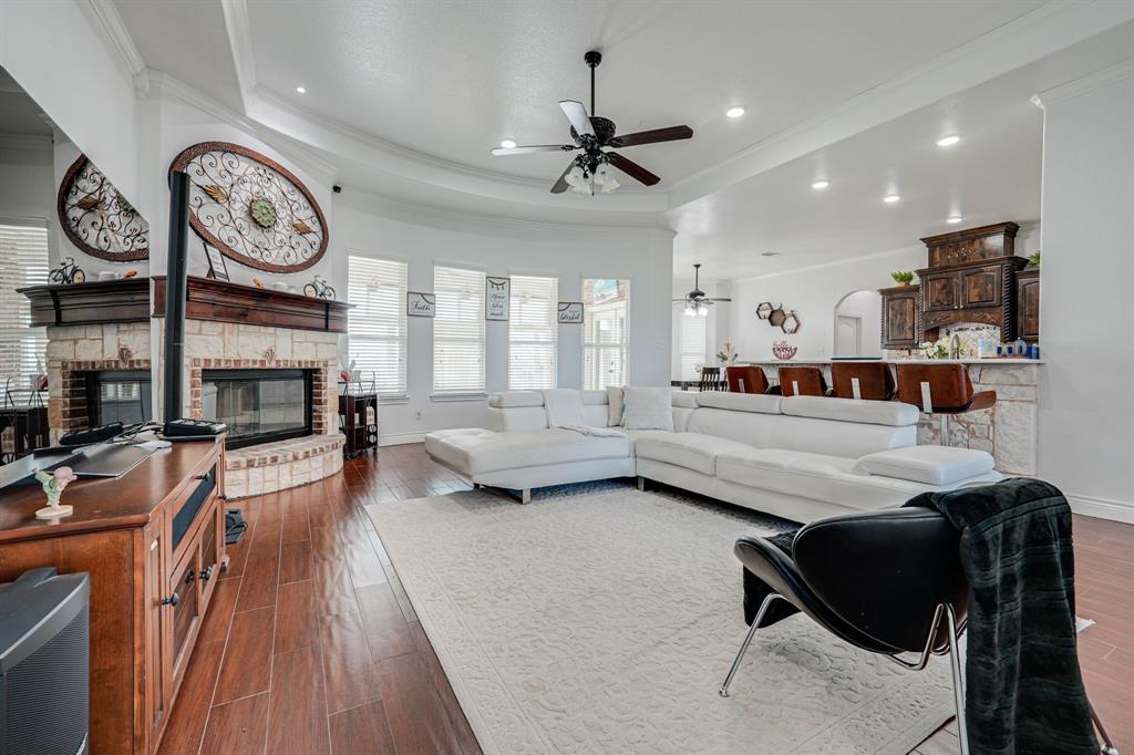 1192 Seaborn Road Ponder, TX 76259 - Photo 8 of 40 a living room with furniture and a clock