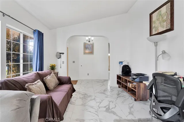 a view of a livingroom with a flat screen tv