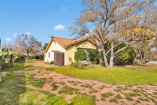 a house view with a outdoor space