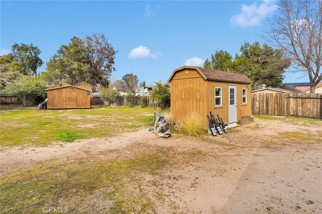 a view of a swimming pool with a yard