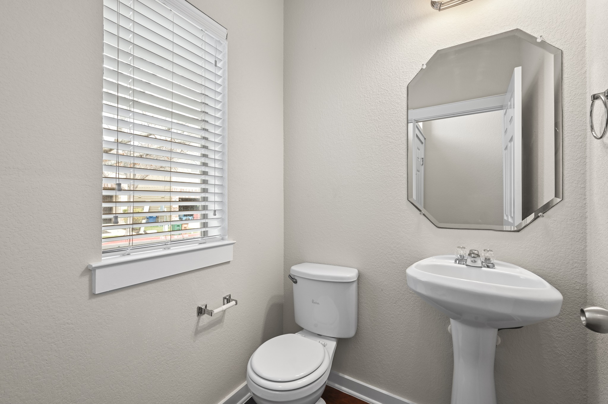 2101 Rivers Edge Way, Unit 32 Austin, TX 78741 - Photo 13 of 24 Half bath downstairs.