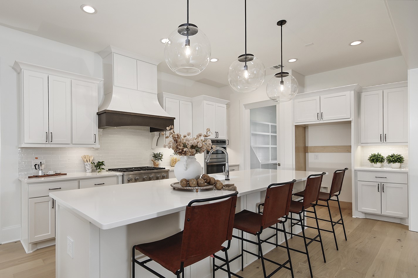 11842 Grand N Road Willis, TX 77378 - Photo 12 of 38 Outstanding kitchen design layout has ample counter and cabinet space ideal for both cooking and entertaining.