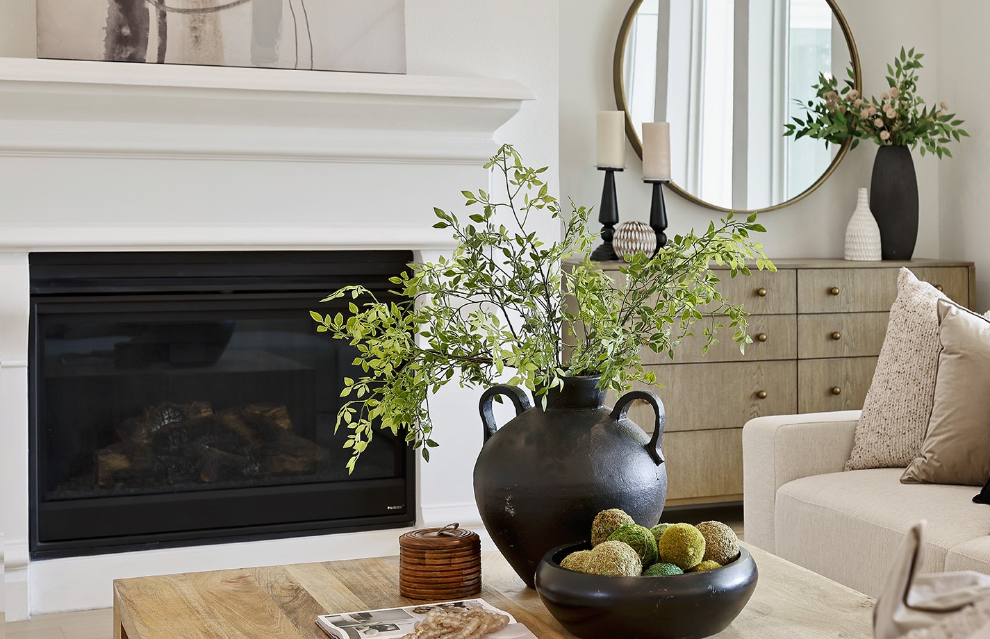 11842 Grand N Road Willis, TX 77378 - Photo 19 of 38 Modern gas log fireplace and elegant mantle are the focus of the living room with thoughtful recessed furniture niche to right.