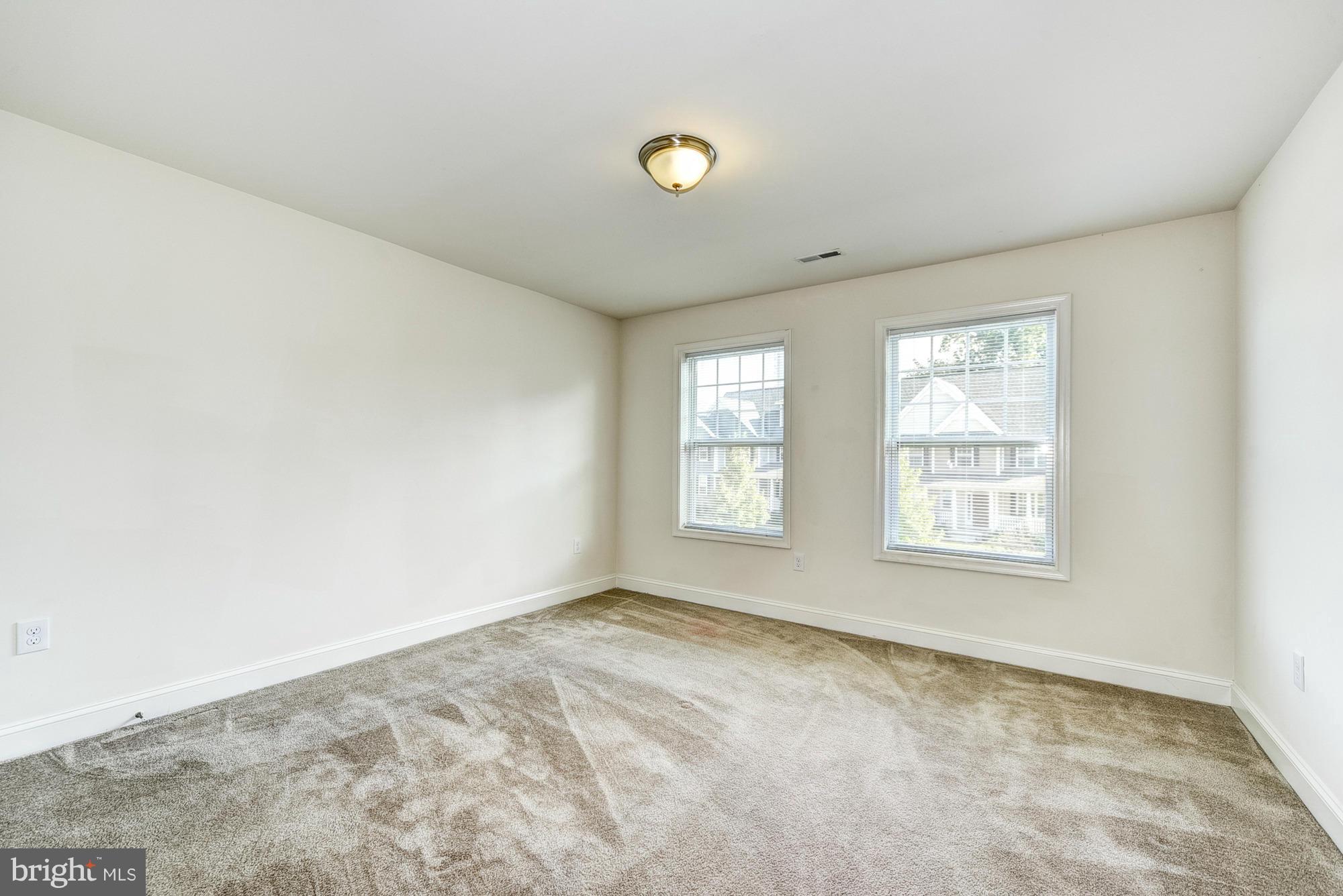 1905 Kermit Road Silver Spring, MD 20910 - Photo 18 of 24 a view of an empty room with a window
