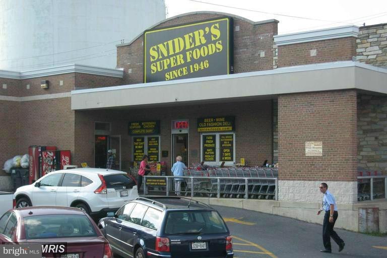 1905 Kermit Road Silver Spring, MD 20910 - Photo 23 of 24 a outdoor living area with furniture and a fireplace