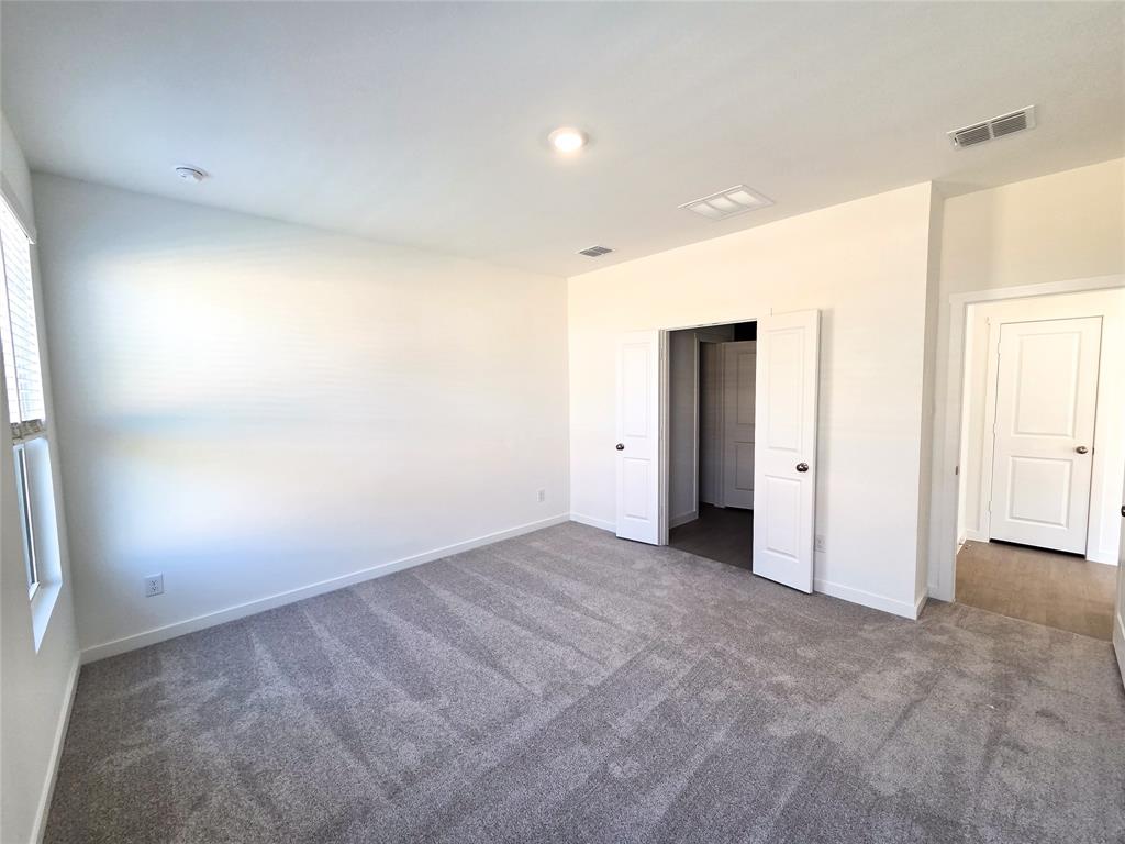 925 Calley Pear Trail Princeton, TX 75407 - Photo 14 of 24 a view of an empty room