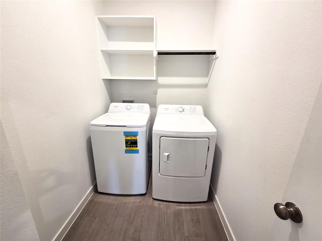 925 Calley Pear Trail Princeton, TX 75407 - Photo 7 of 24 a utility room with dryer and washer