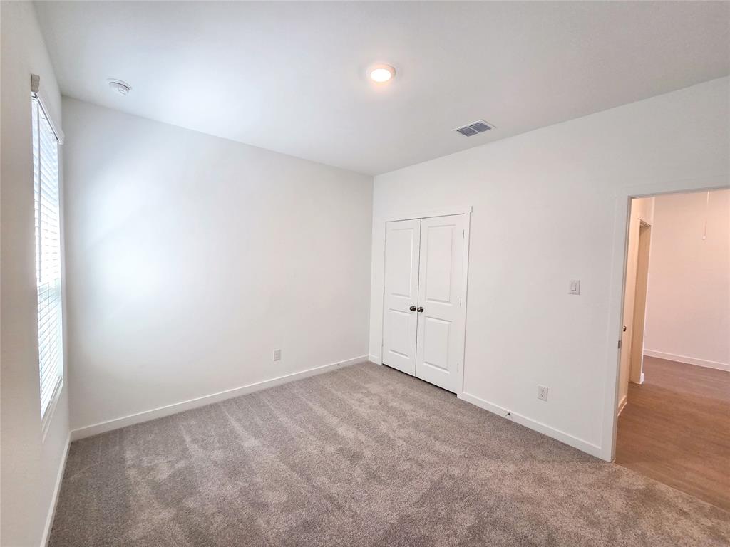 925 Calley Pear Trail Princeton, TX 75407 - Photo 9 of 24 a view of an empty room