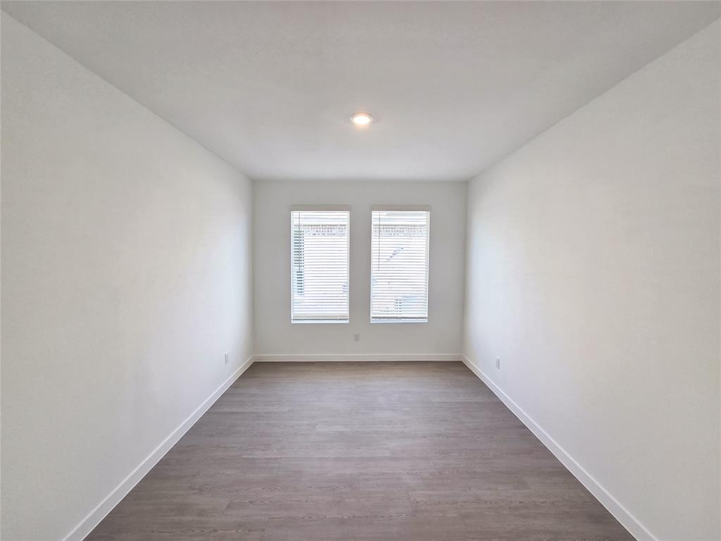 925 Calley Pear Trail Princeton, TX 75407 - Photo 10 of 24 an empty room with a window