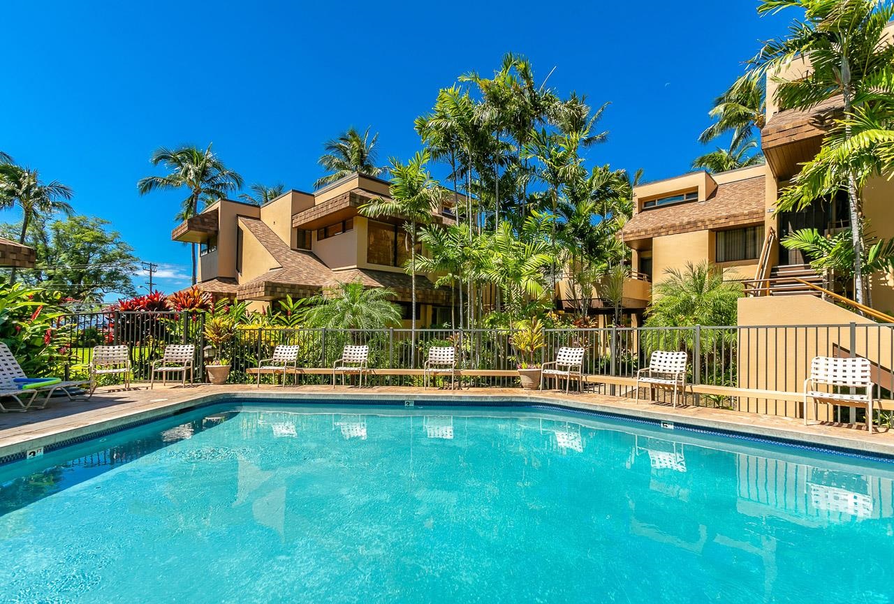 2381 South Kihei Road, Unit B107 Kihei, HI 96753 - Photo 19 of 29 a view of a house with a yard and sitting area