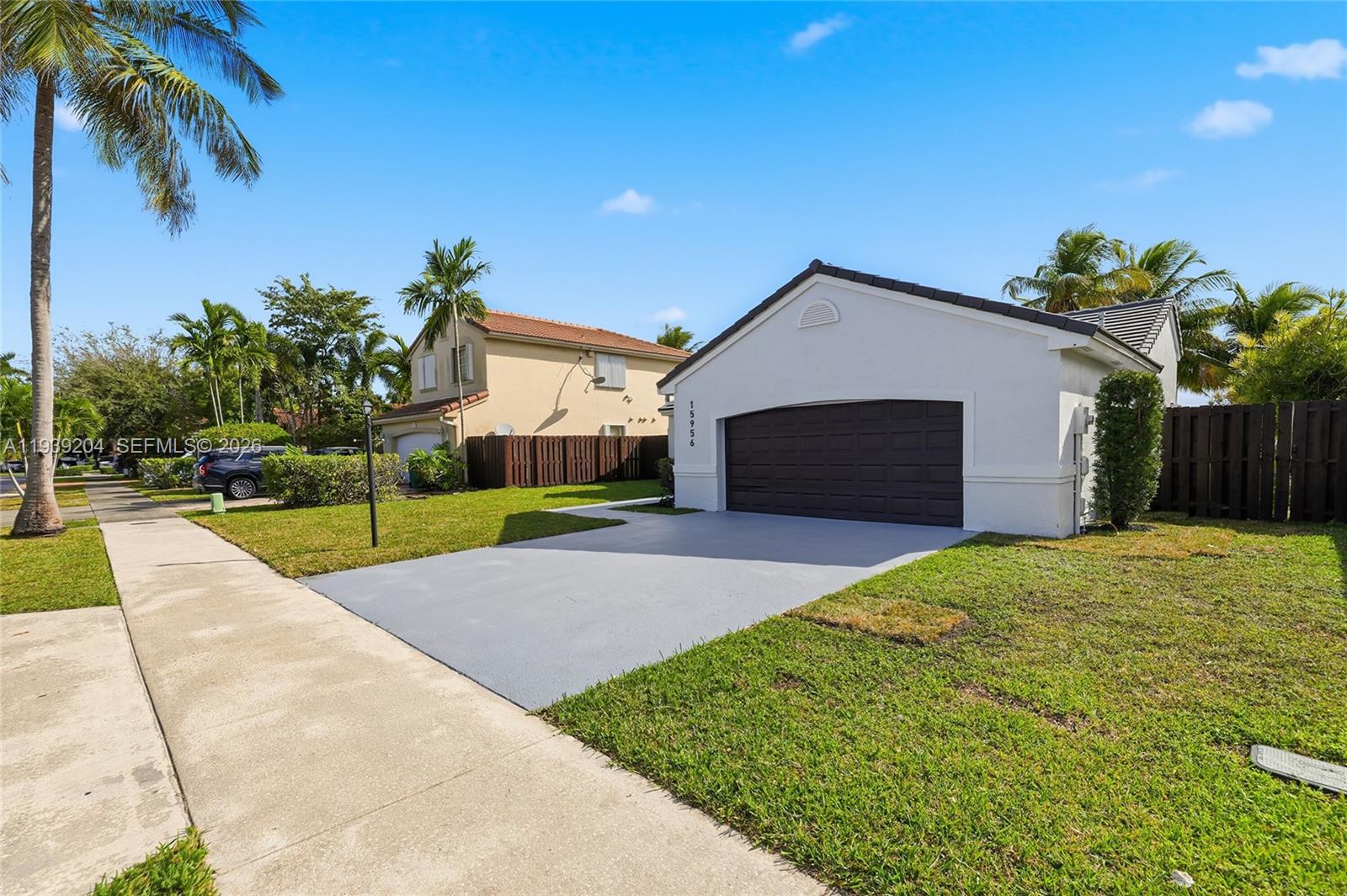 15956 Southwest 83rd Terrace Miami, FL 33193 - Photo 26 of 44 a view of outdoor space yard and swimming pool