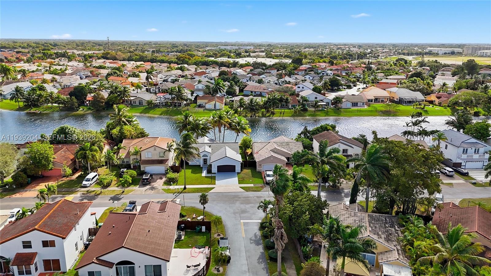 15956 Southwest 83rd Terrace Miami, FL 33193 - Photo 31 of 44 an aerial view of residential houses with outdoor space