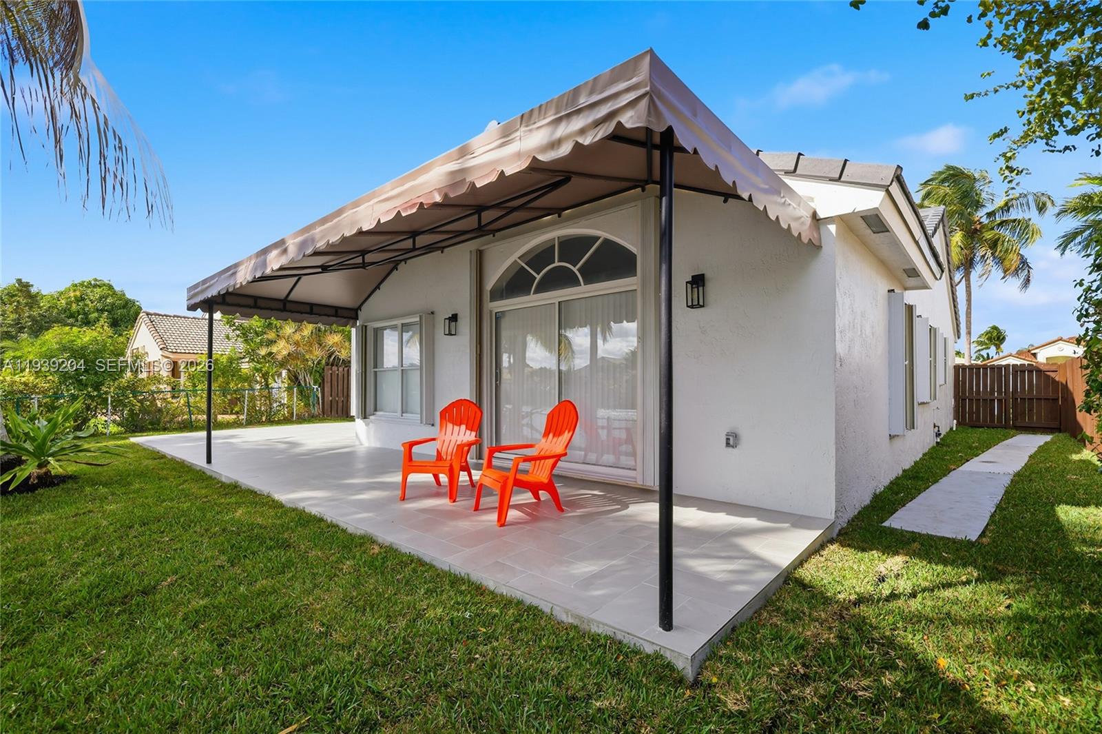 15956 Southwest 83rd Terrace Miami, FL 33193 - Photo 33 of 44 swimming outdoor space with patio