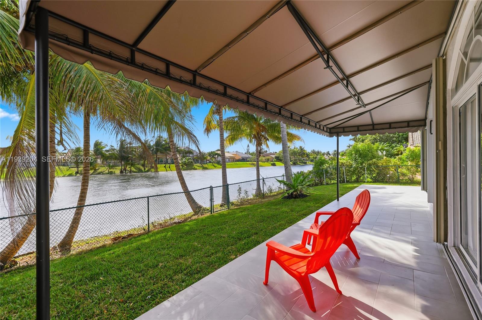 15956 Southwest 83rd Terrace Miami, FL 33193 - Photo 34 of 44 a view of swimming pool with a backyard