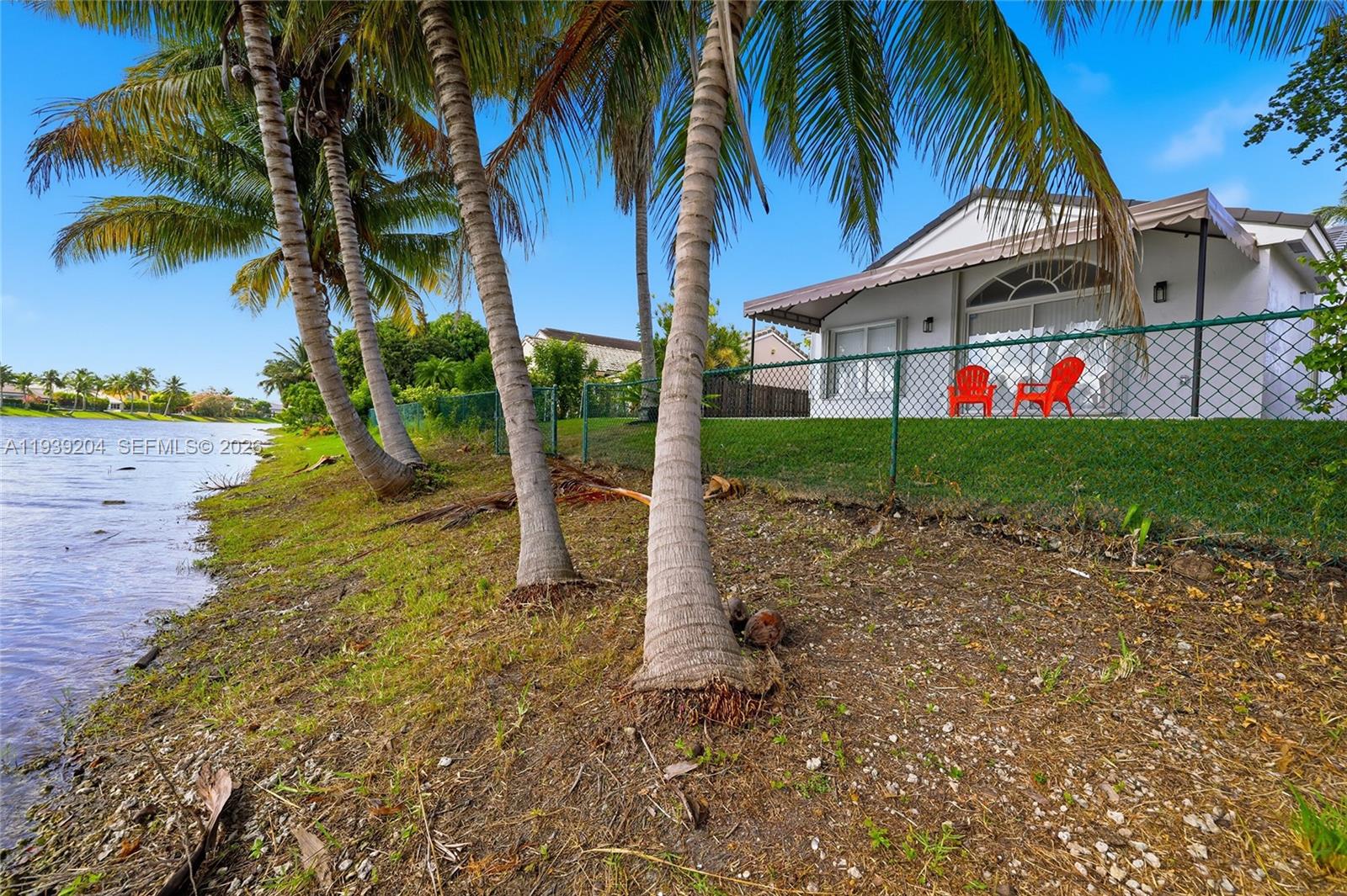15956 Southwest 83rd Terrace Miami, FL 33193 - Photo 37 of 44 a view of small yard in front of house