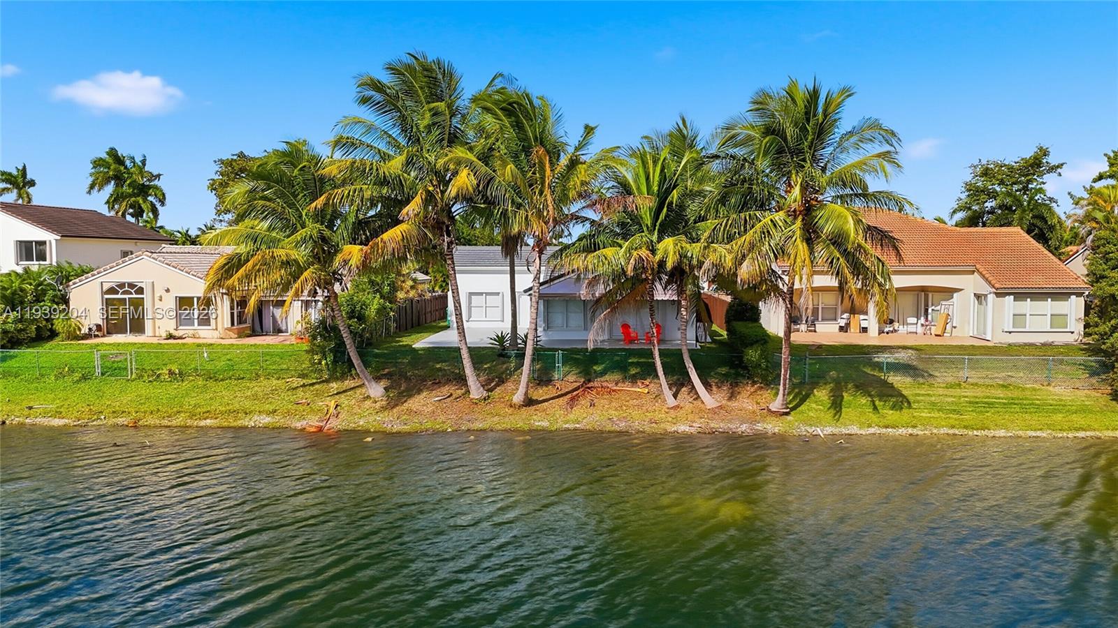 15956 Southwest 83rd Terrace Miami, FL 33193 - Photo 41 of 44 a view of a house with a yard