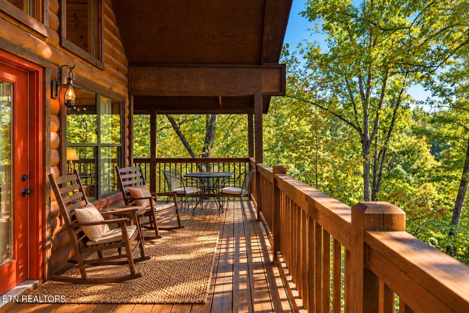 2440 Breezy Road Sevierville, TN 37876 - Photo 3 of 35 Sunlit Rustic Cabin Porch Retreat