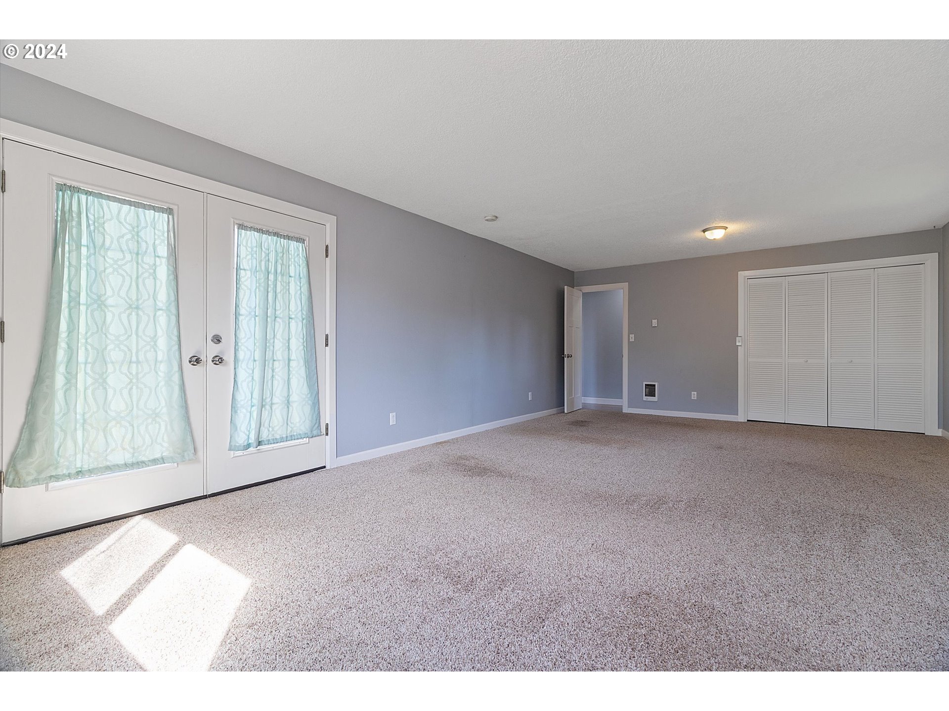 8412 Northeast 27th Avenue Vancouver, WA 98665 - Photo 18 of 36 a view of an empty room with a window