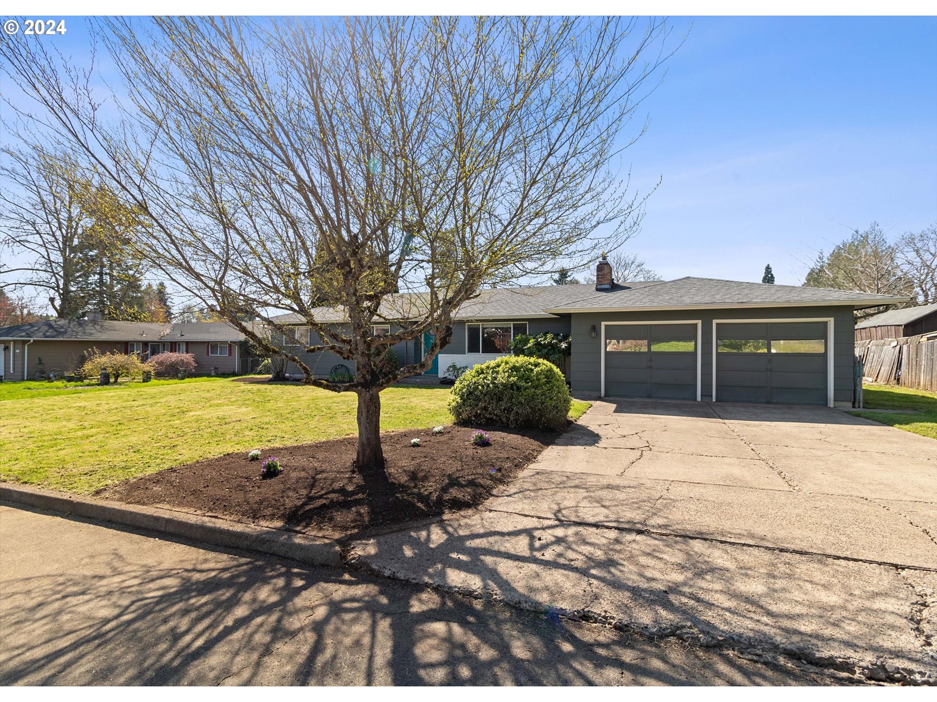 8412 Northeast 27th Avenue Vancouver, WA 98665 - Photo 4 of 36 a view of a house with a yard and sitting area