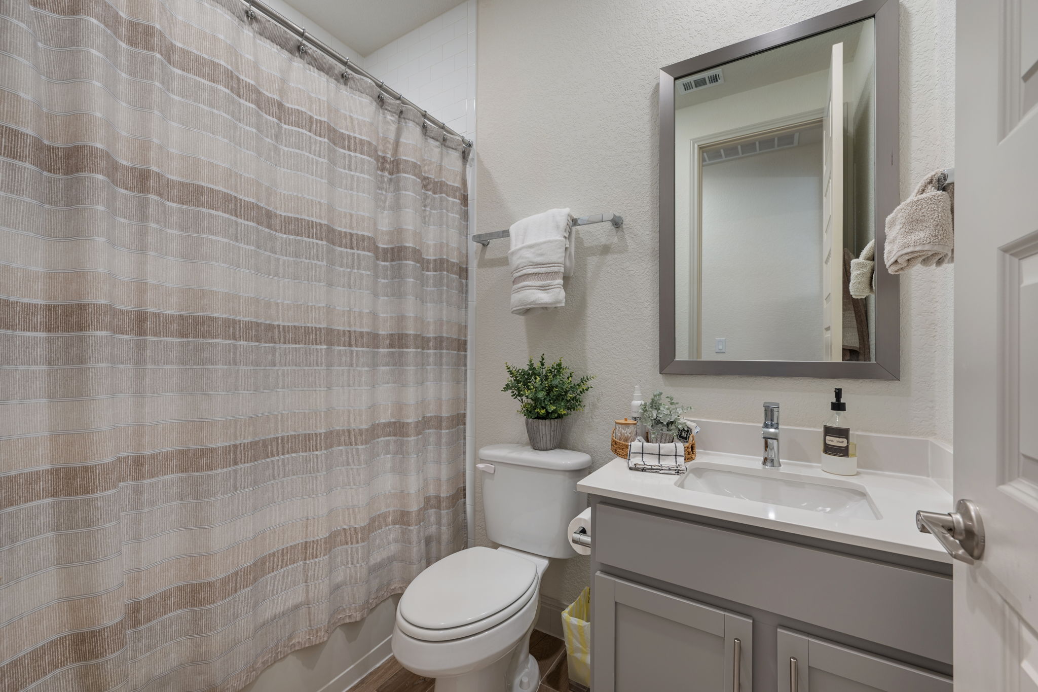 1808 Weavers Bend Georgetown, TX 78628 - Photo 22 of 30 a bathroom with a sink toilet and shower